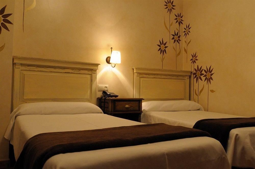 วายไอที ปวยร์ตา บิซากรา Hotel โตเลโด ห้อง รูปภาพ